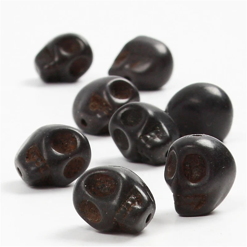 Howlite, Dia. 12 mm, Hålstl. 1,5 mm, svart, 32 st./ 1 förp. [HOB-69921]
